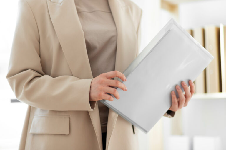 person holding documents